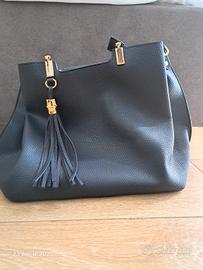 Borsa effetto pelle martellato