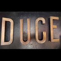 Antica scritta Duce del ventennio  in bronzo fuso.