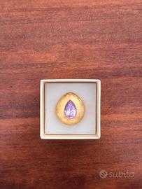 Anello regolabile con goccia zircone viola