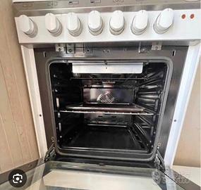 Cucina 4 fuochi gas metan/gpl forno gas/elettrico