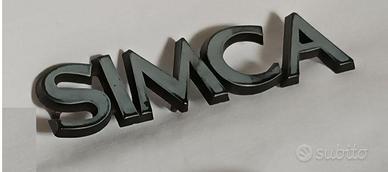 scritta SIMCA in materiale plastico