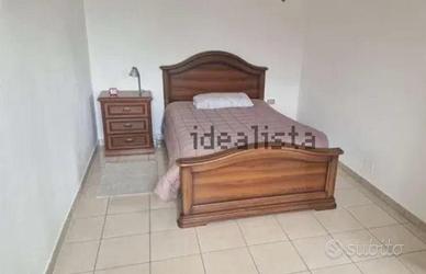 Camera da letto salotto e divano