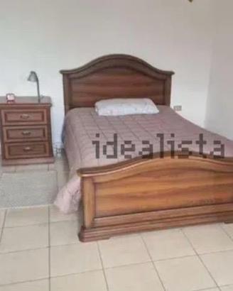 Camera da letto salotto e divano