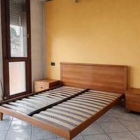 camera da letto con comodini