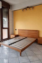 camera da letto con comodini