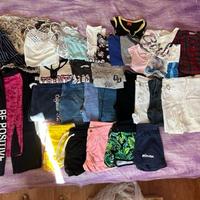 Stock di magliette t-shirt,top pantaloni giacche