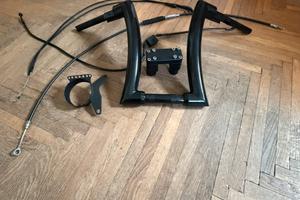 Manubrio alto + riser + cavi