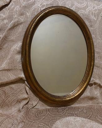 Specchio ovale di legno