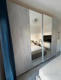Camera da letto matrimoniale con letto contenitore