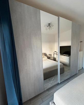 Camera da letto matrimoniale con letto contenitore