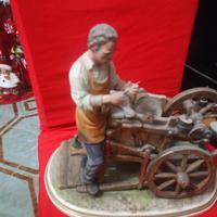 statua arrotineria ceramica 