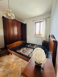 Camera da letto in stile arte povera