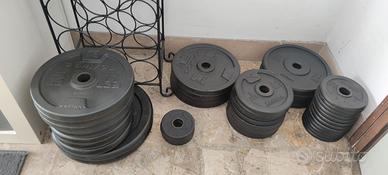 Dischi ghisa e bilanciere pesi pizze palestra Gym 