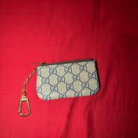 Portamonete gucci jeans accessorio