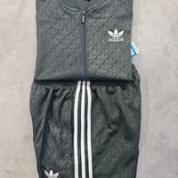 tuta Adidas unisex grigia e bianca 