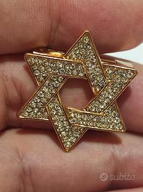 Spilla a forma di stella ebraica