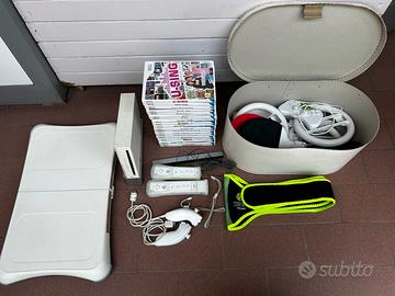 Nintendo Wii + Wii Fit + giochi + accessori