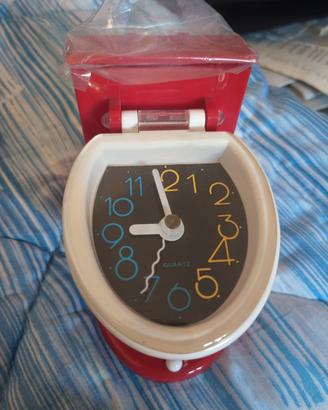 Orologio a forma di water