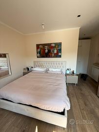 Letto king size con vano ripostiglio