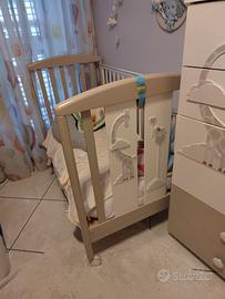 culla e settimino con giraffa ed elefante pali