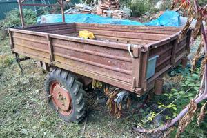 carro trazionato con ribalta manuale