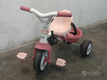 Triciclo con asta guida