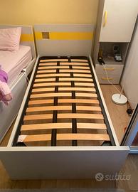 Letto singolo con rete a doghe e materasso
