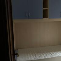 Camera con armadio a ponte