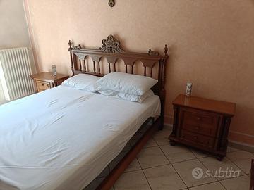 Camera da letto in legno massello