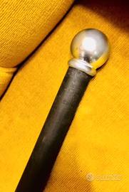 Bastone da passeggio e gentiluomo.