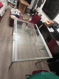 Tavolo allungabile in vetro temperato e acciaio