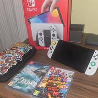 Nintendo Switch Oled + zelda + mario + custodia