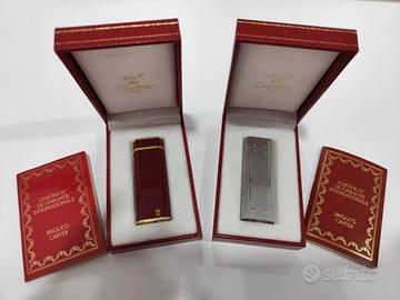 Accendini NOS Cartier Vintage Santos e Red Laque