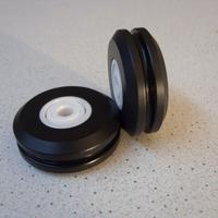 Pulegge per arbaleti di tipo vela e similari.