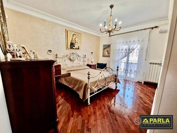 Letto matrimoniale in ferro battuto e ottone
