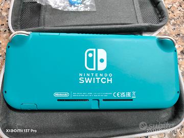 Switch Lite turchese +custodia da viaggio +1 Gioco