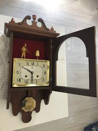 Orologio a pendolo da parete, Melux