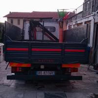 Nissan eco t 100 con gru ribaltabile trilaterale 