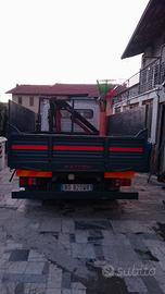 Nissan eco t 100 con gru ribaltabile trilaterale 