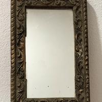 Specchio  antico con cornice in legno  decorata