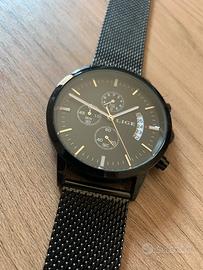 Orologio nero in maglia milanese