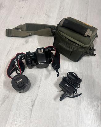 Canon EOS 1100D + obiettivo 18-55mm + caricabatter