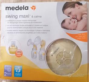 Tiralatte Medela swing maxi & calma