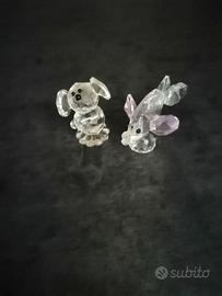 Coppia di oggetti in vetro a forma di animaletti