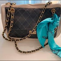 Borsa pochette POMIKAKI