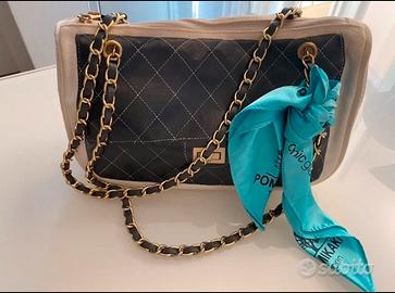 Borsa pochette POMIKAKI