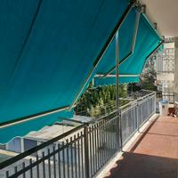 Coppia di tende da sole a bracci estensibili