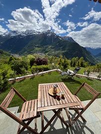Appartamento con vista e giardino