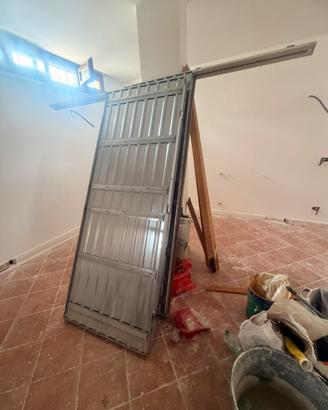 Porta scorrevole a scomparsa