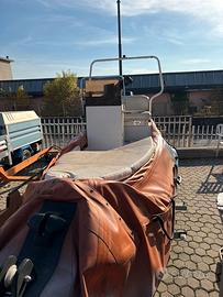 Gommone con motore 25 cv e rimorchio